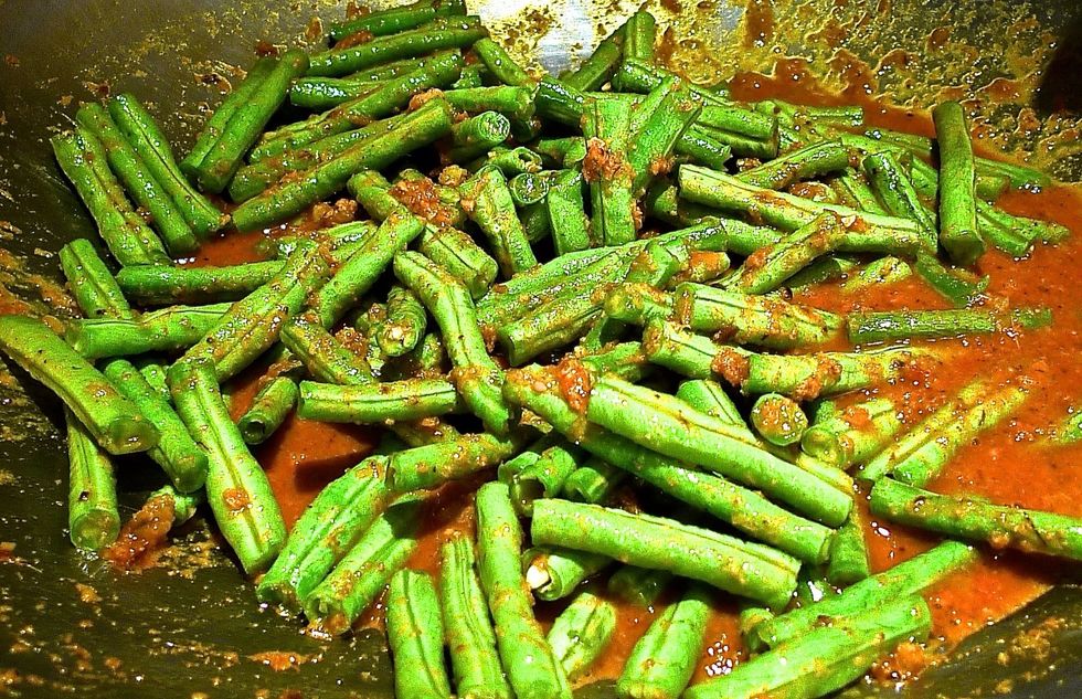 Add salt and chicken stock to taste. Cover and simmer on low heat.