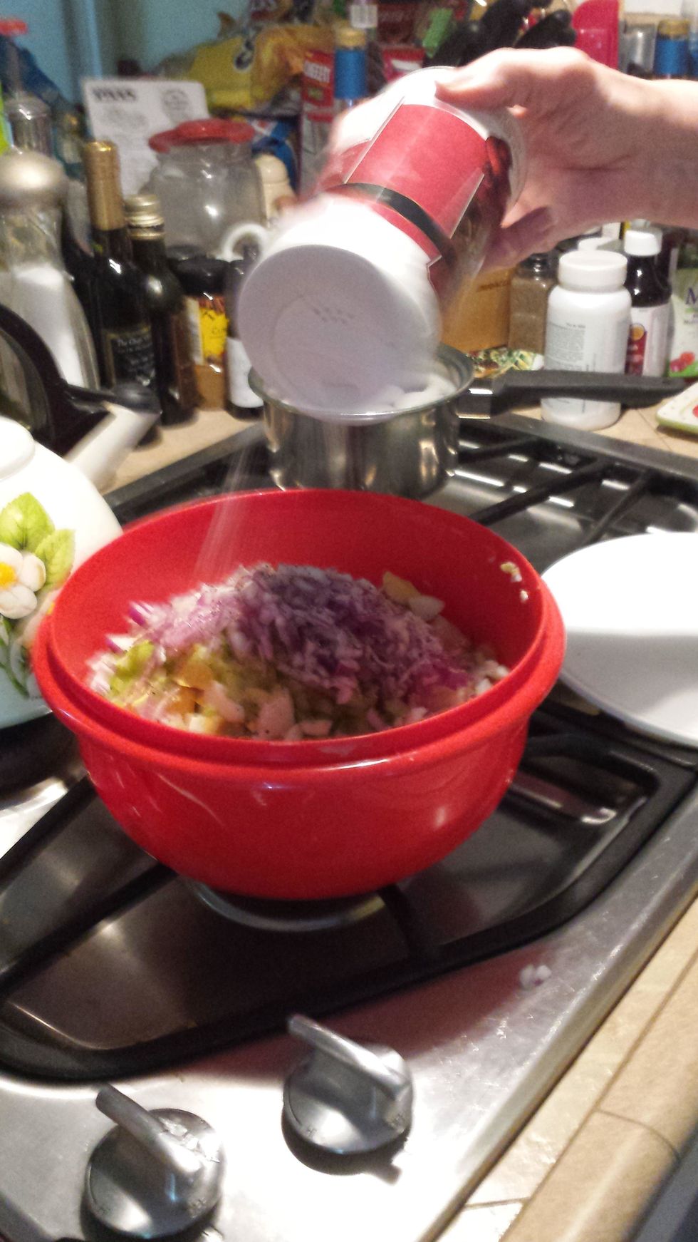 Add salt and pepper to the bowl of ingredients. (however much you want.)