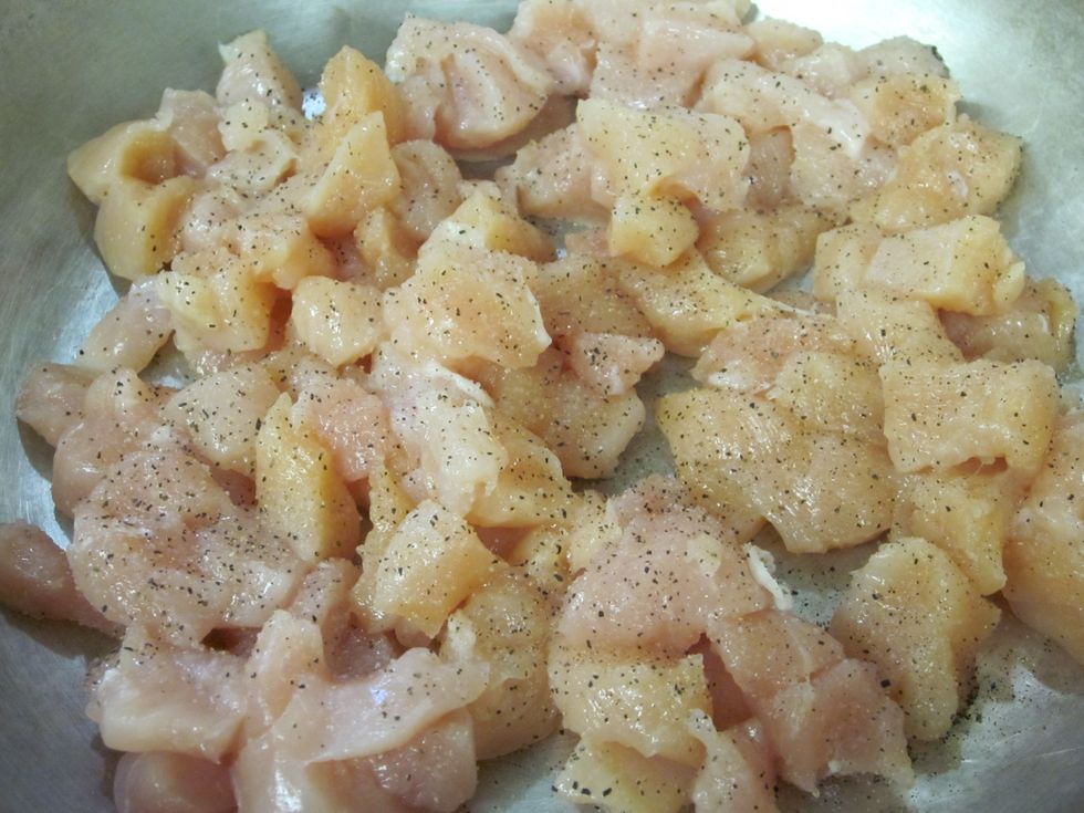 Add salt and pepper to the chicken for taste.