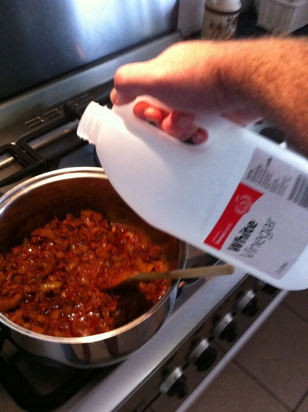 Add salt and vinegar and stir well.