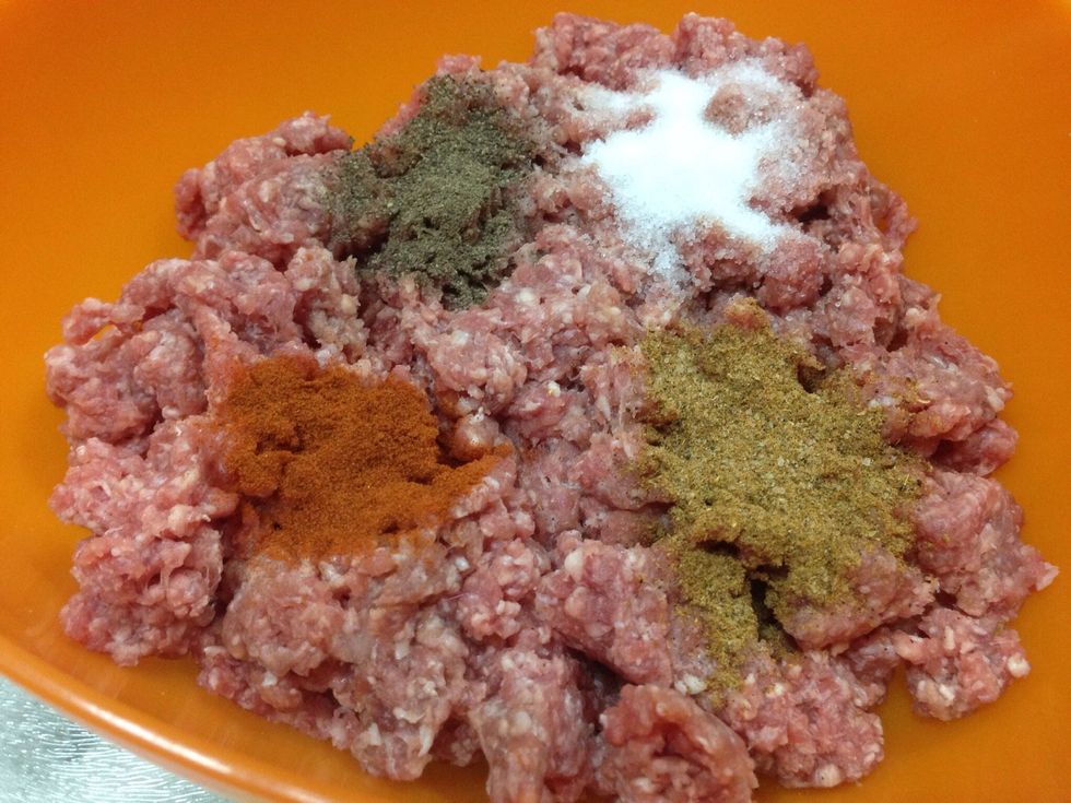 Add salt, black pepper, spices beef, and paprika to the beef .