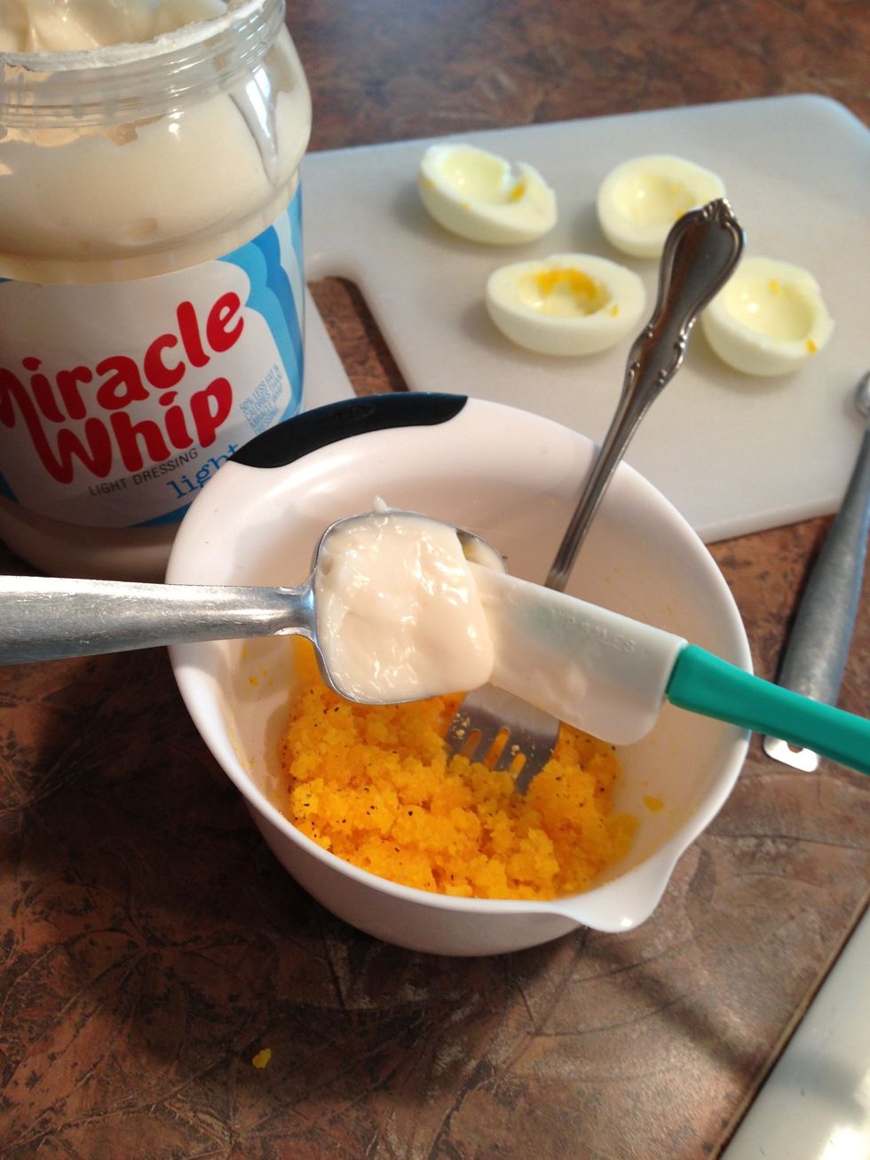 Add salt, pepper, dry mustard and salad dressing. I prefer Miracle Whip Lite. The regular will work as would mayonnaise.