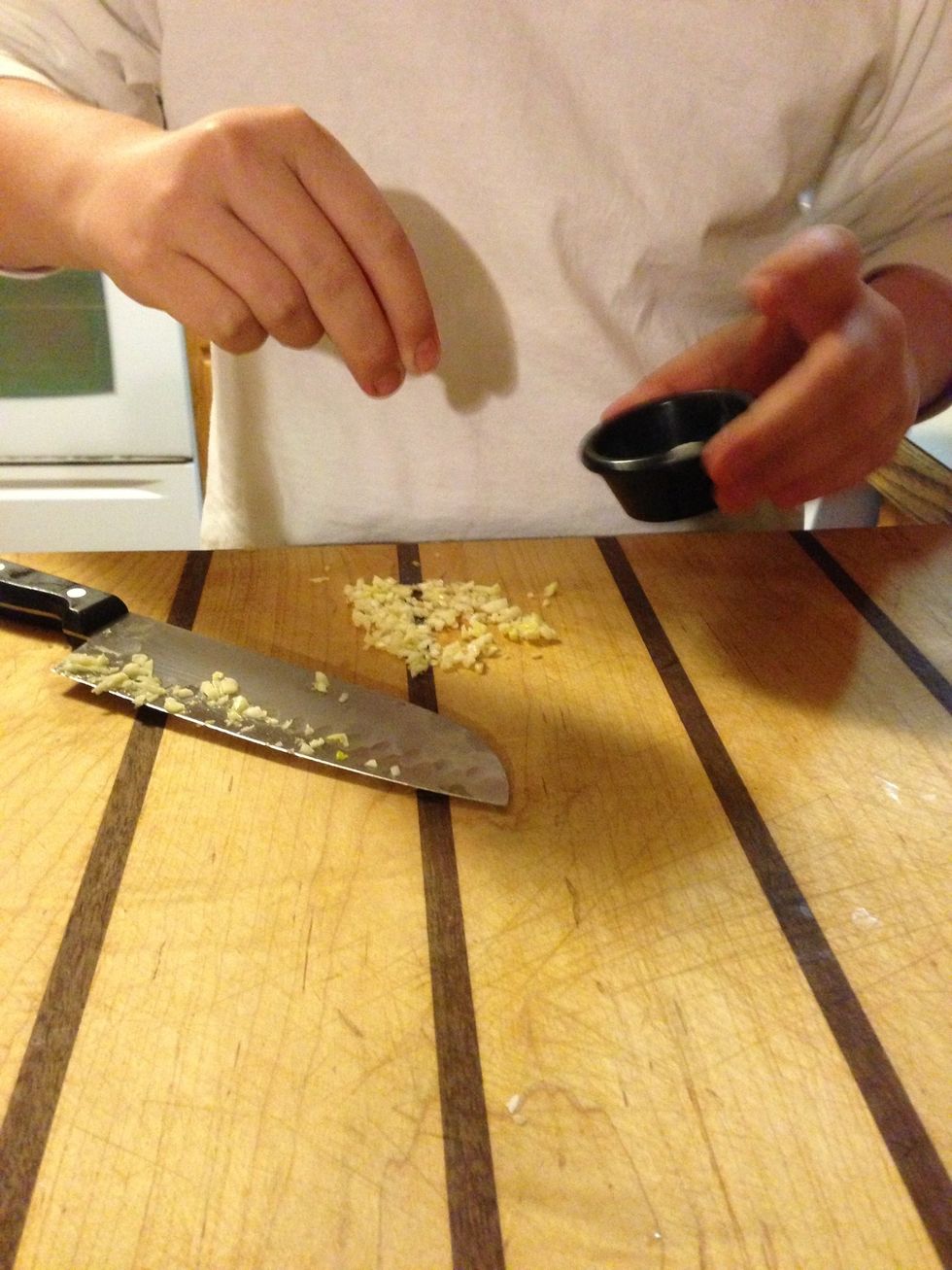 Add salt, this causes the flavors of the garlic to release!