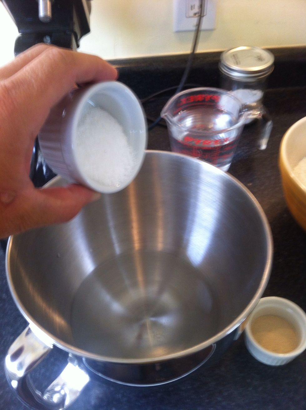Add salt to water and stir to dissolve the salt.