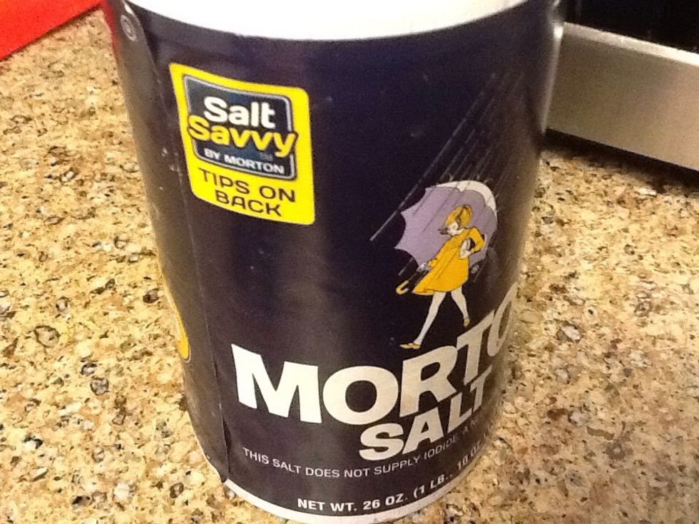 Add salt when half cooked. You may also add some turmeric powder.