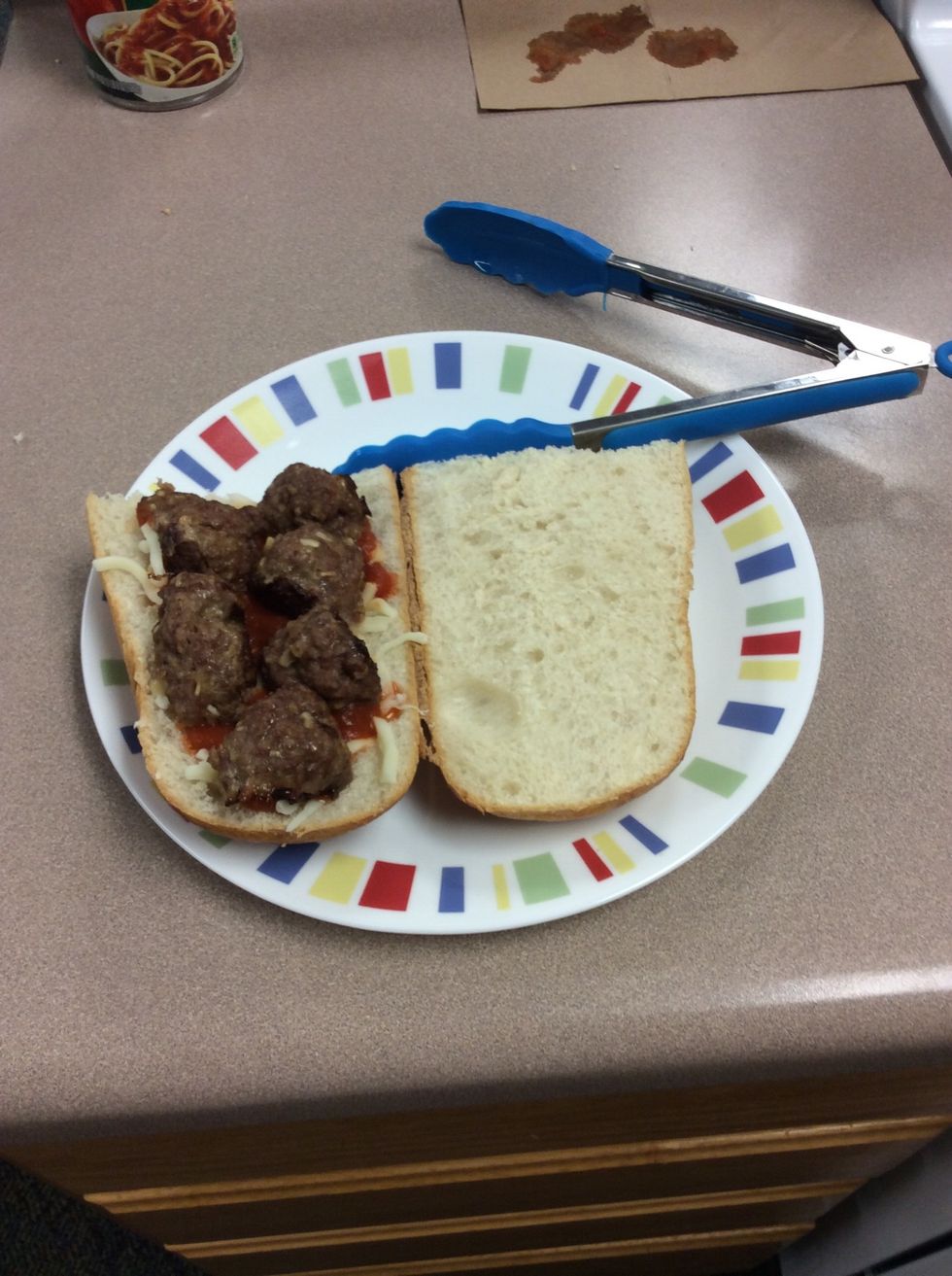 Add sauce, cheese, and meatballs on toasted bread