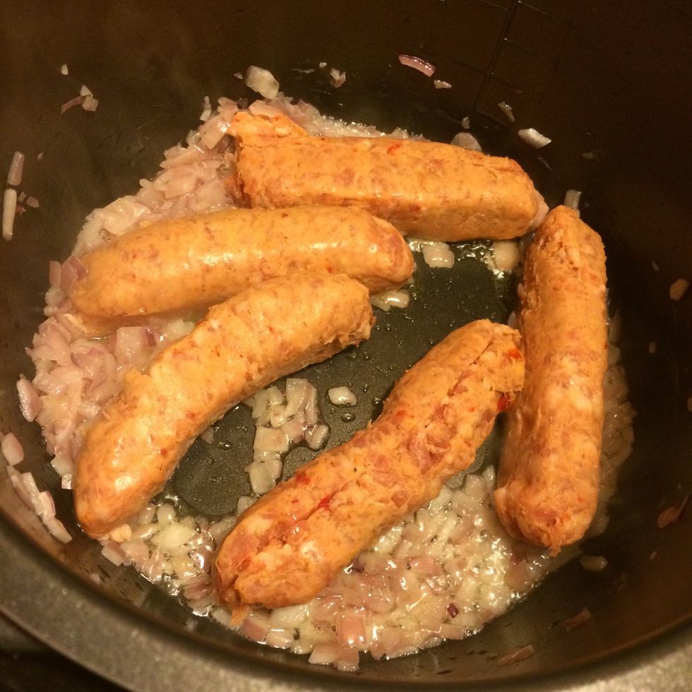 Add sausage links and brown, breaking up the sausage into small chunks...
