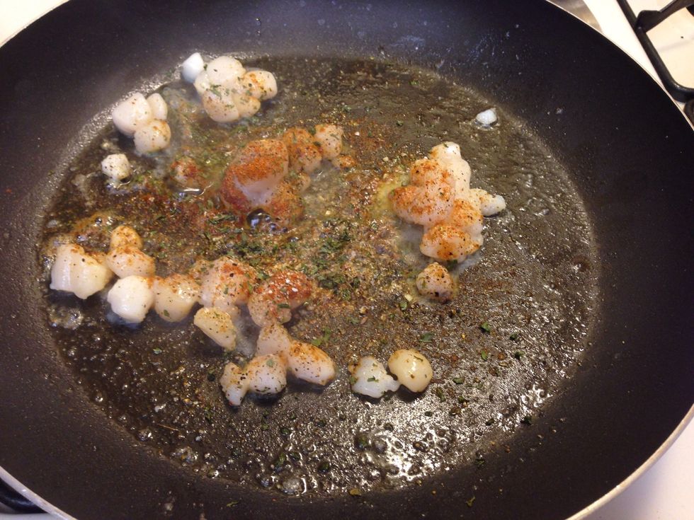 Add scallops and desired seasoning to pan on medium/high heat