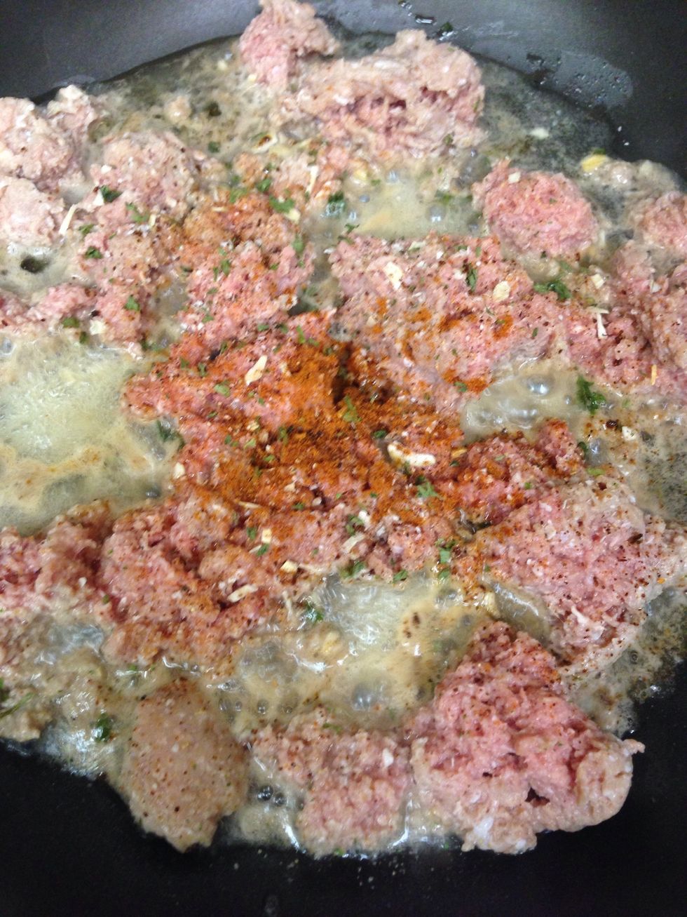 Add seasoning to raw meat before cooking