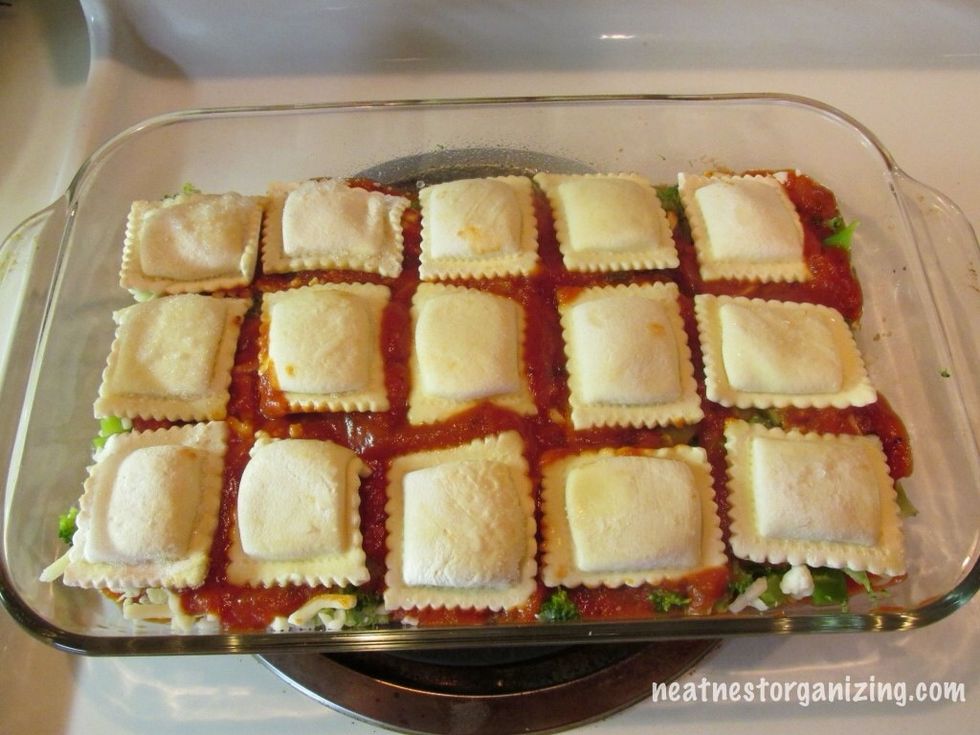 Add second & final layer of frozen ravioli.