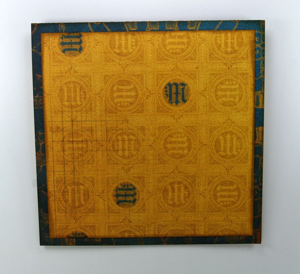 Add second layer cut at 5 x 5 inches using double sided adhesive tape.