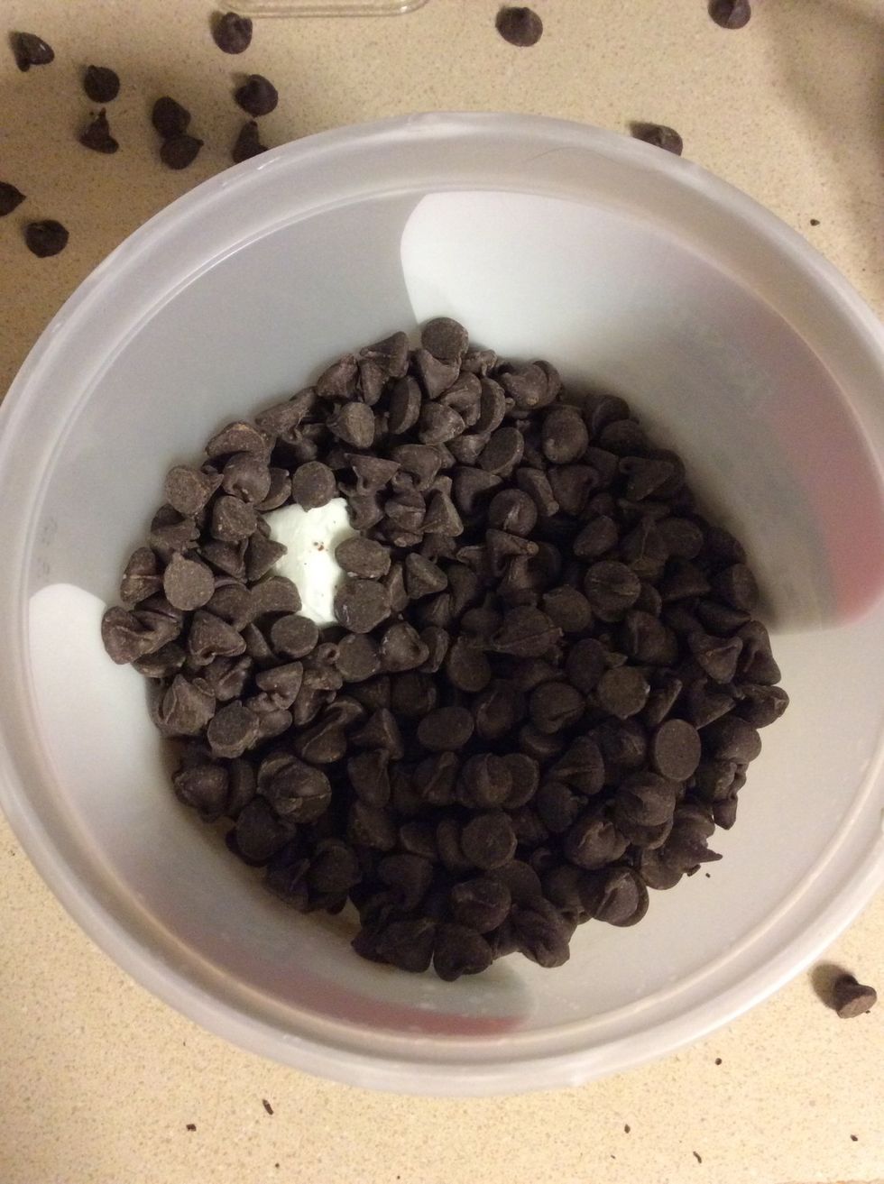 Add semi sweet chocolate chips and shortening in a microwaveable bowl.