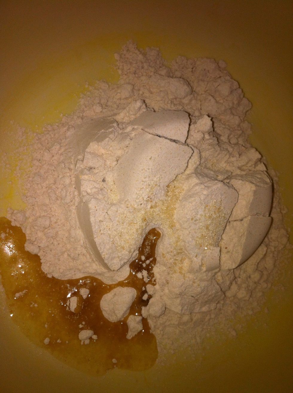 Add semolina,salt,sugar & Greek Yoghurt. Mix them well.Now add some water, little at a time and continue to mix. If the dough is too tight it will not roll well;if its too soft it will absorb more oil