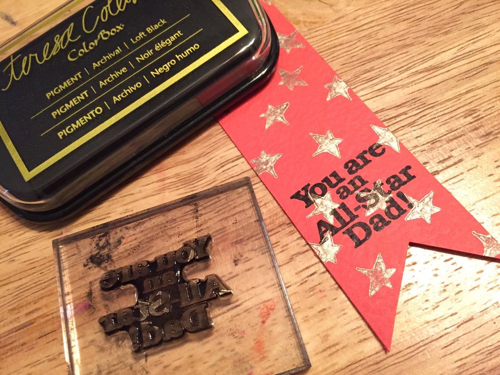 add sentiment to end of red banner using Loft Black Ink.