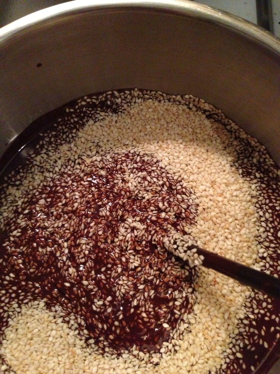 Add sesame seeds into the mixture.
