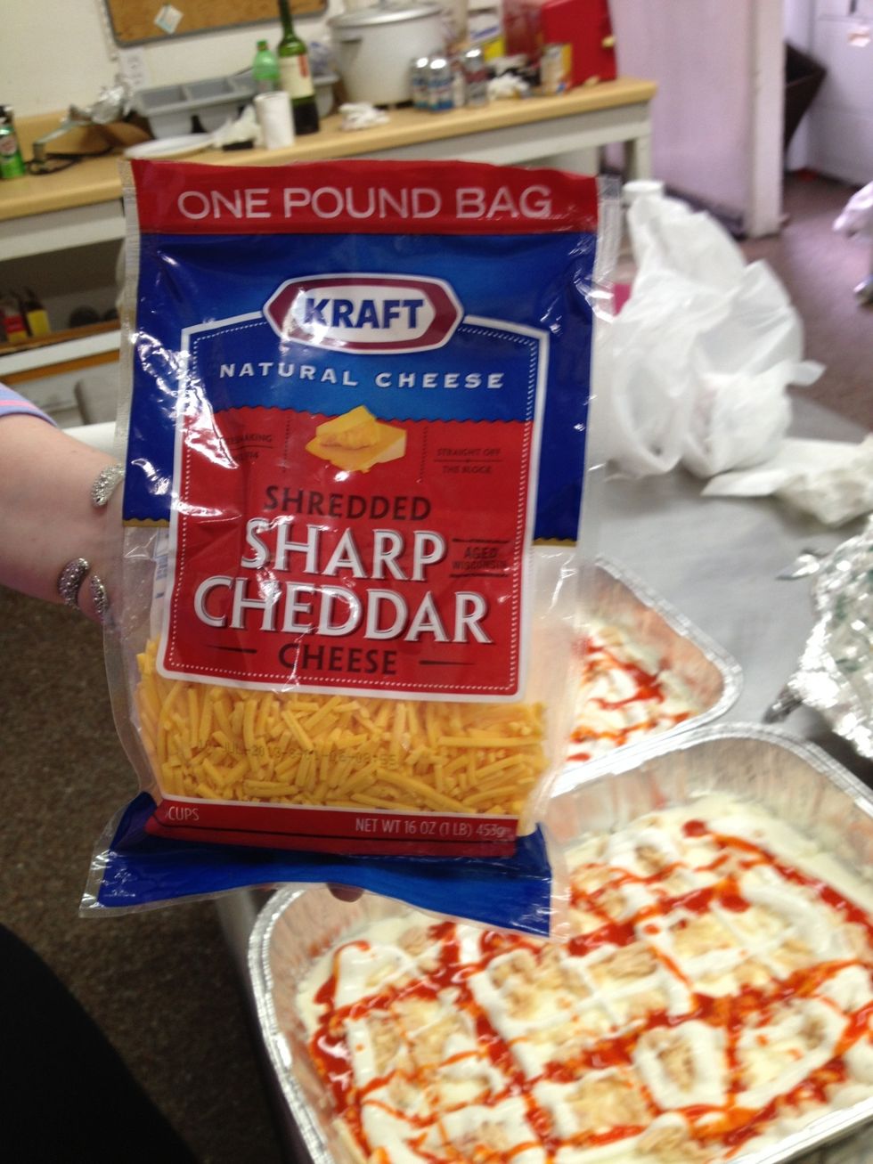 Add sharp cheddar cheese to top fully covered.