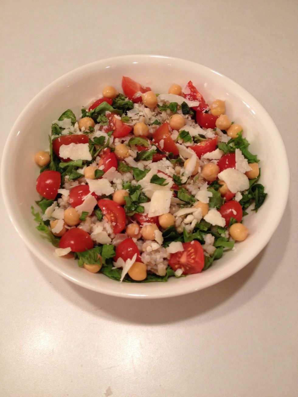 Add shaved Parmesan cheese and basil.