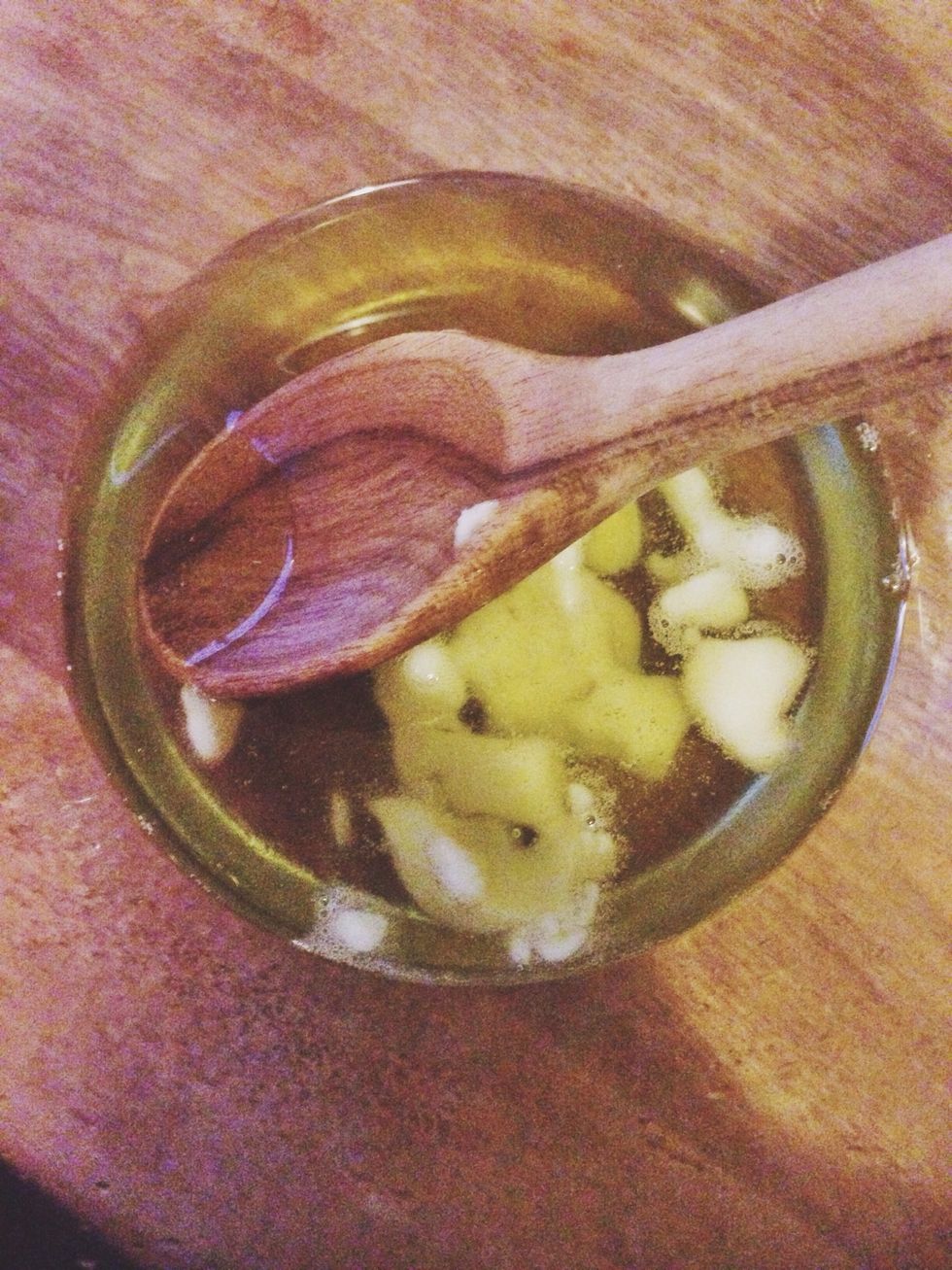 Add shea butter and arrowroot powder to coconut oil infusion.