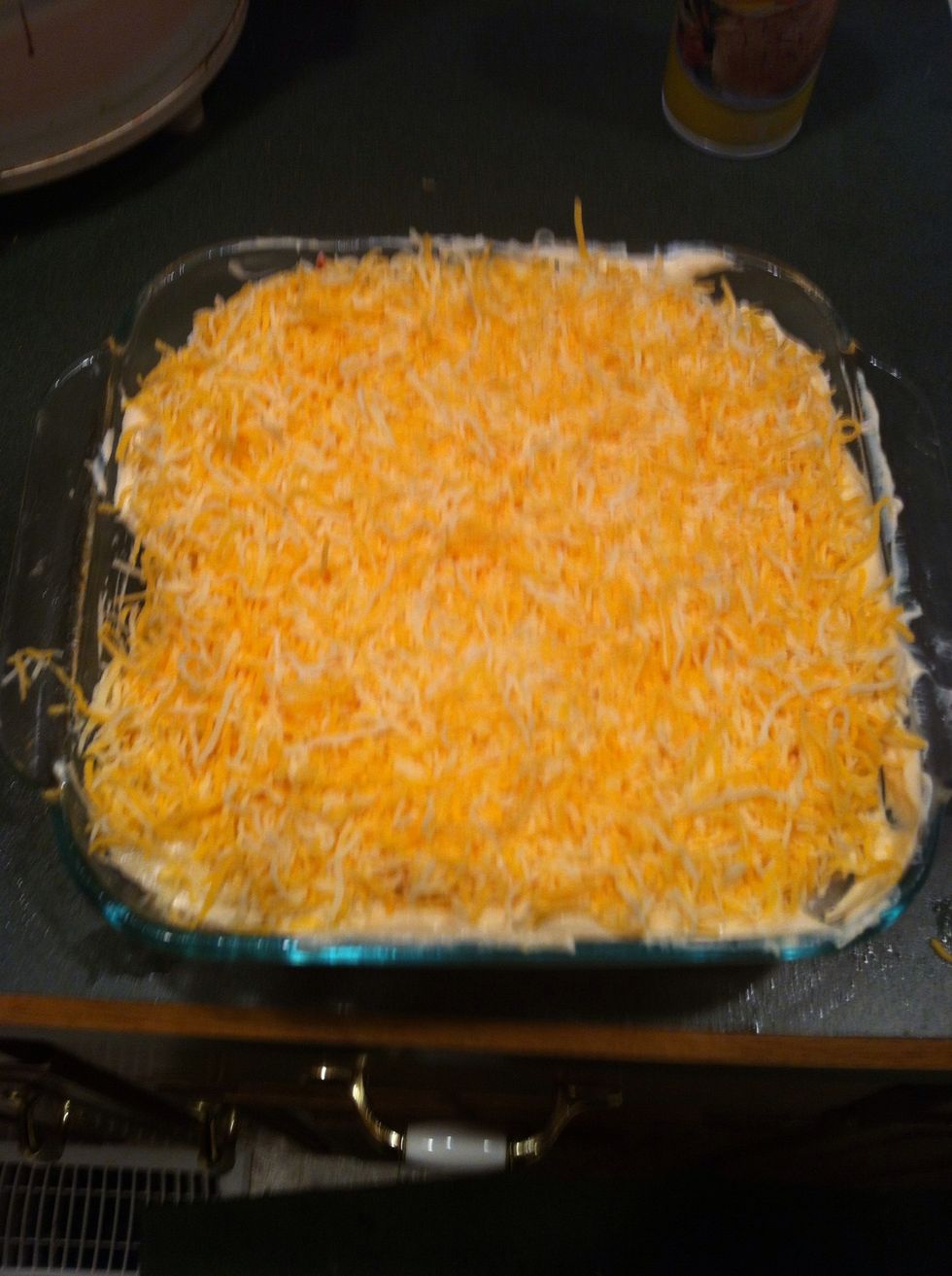 Add shredded cheese, bake on 350 for an hour.