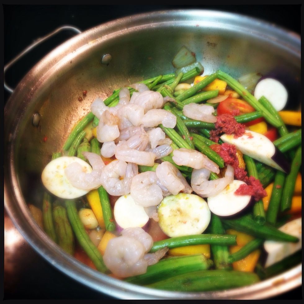 Add Shrimp and shrimp paste - simmer until vegetables and shrimps are cooked.