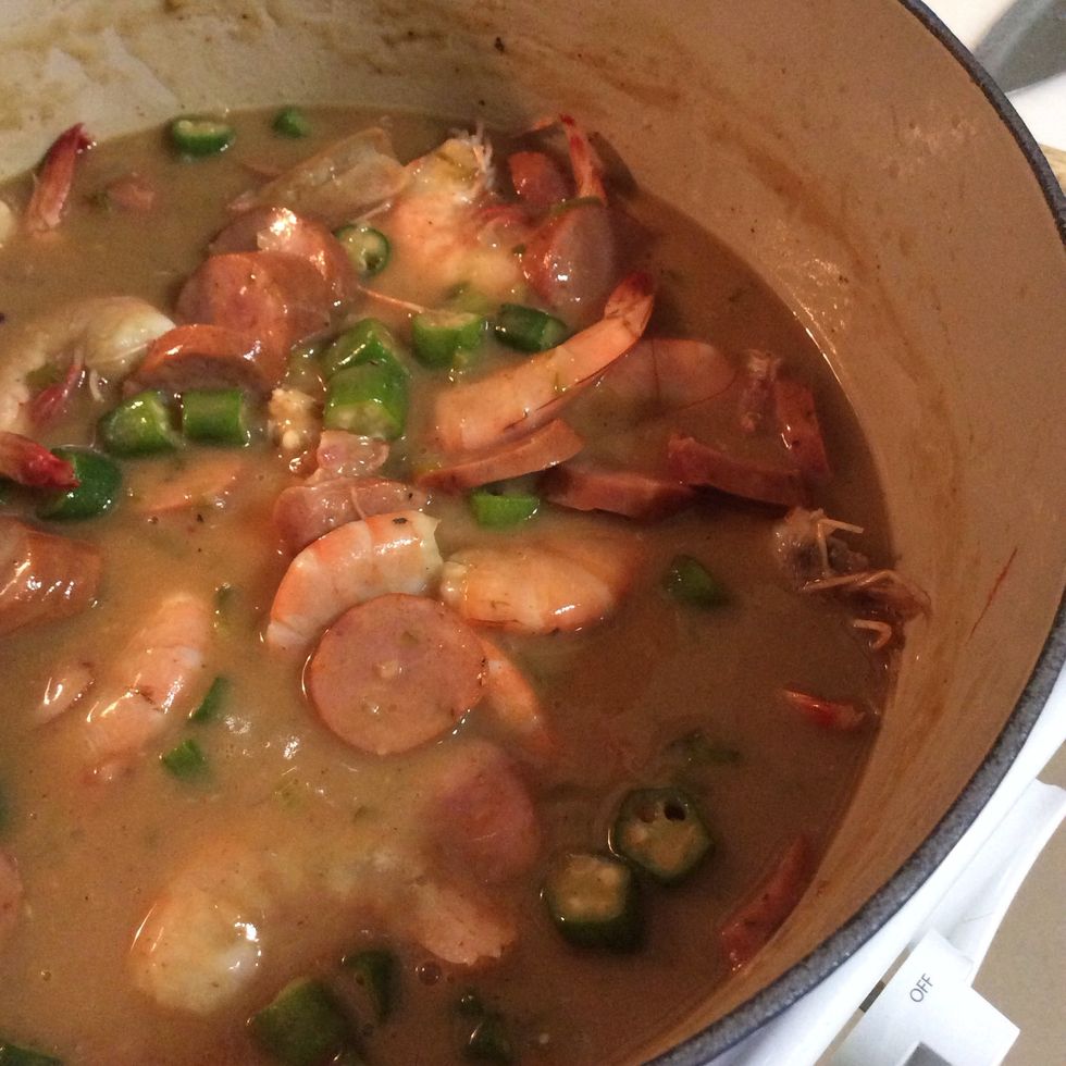 Add shrimp, okra, bacon and andouille sausage ; stir to mix... (I kept the shrimp  whole for added flavor and decorative reasons)
