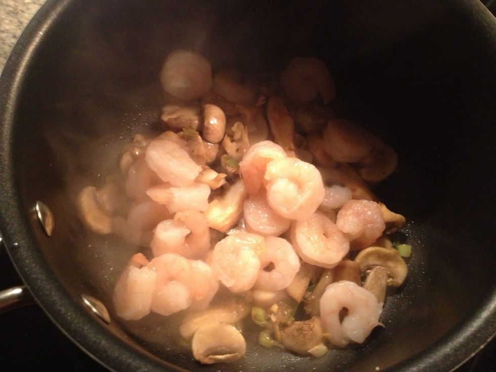 Add shrimp to veggies, add 1 Tablespoon of soy sauce and cook for 2-3 minutes