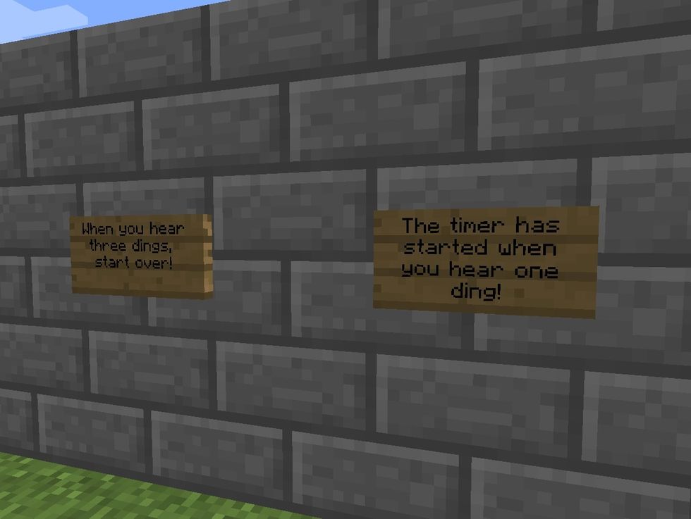 Add signs that explain what the player will hear when the maze starts and ends.