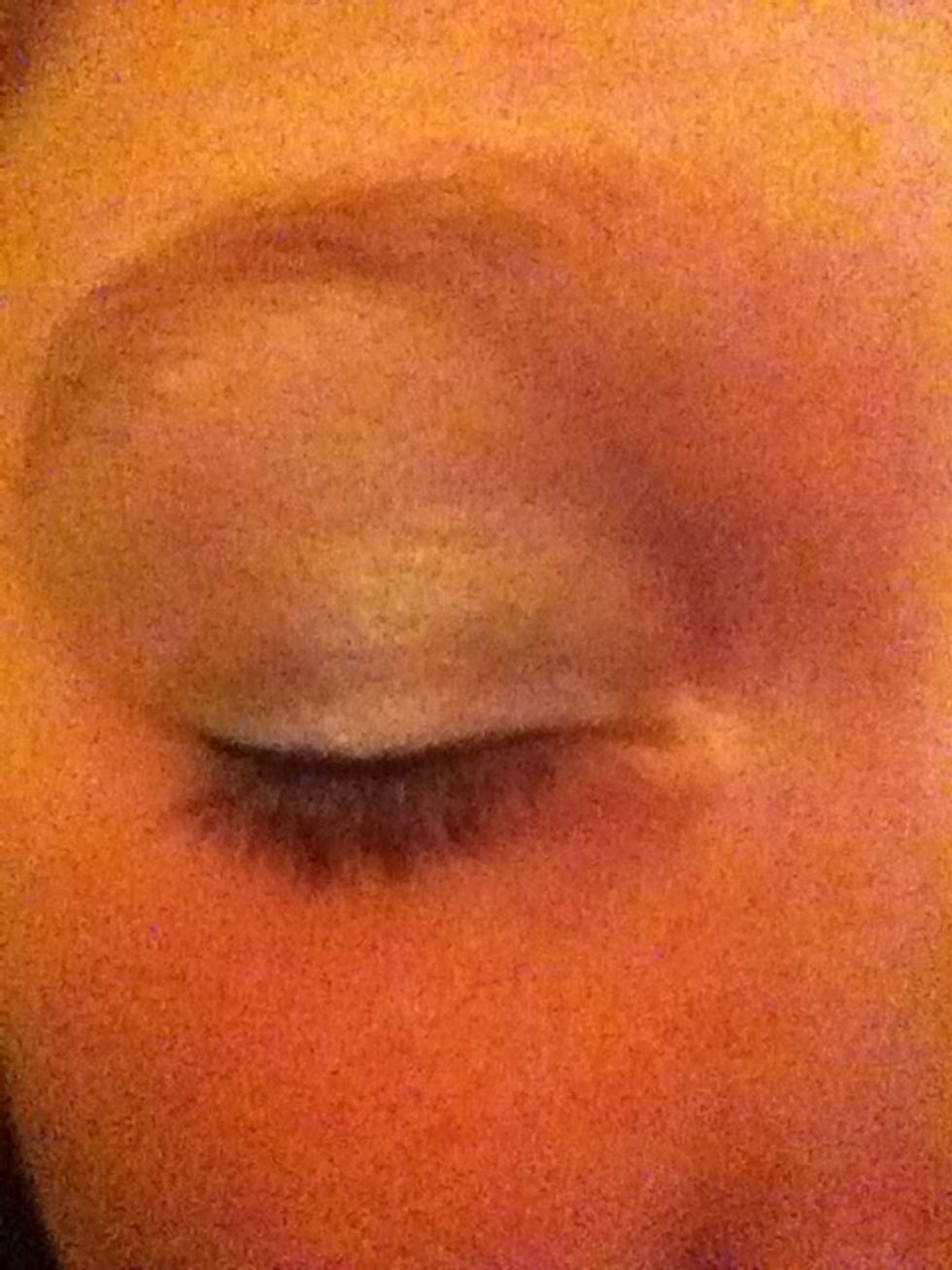 Add silver again to eye in between socket and brow line, lightly dust white eyeshadow all over eye.