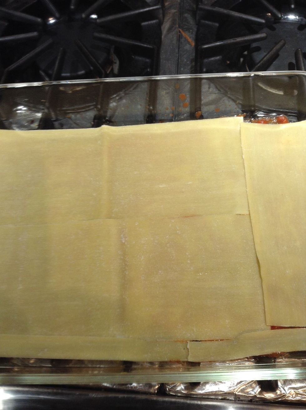 Add single layer of fresh pasta