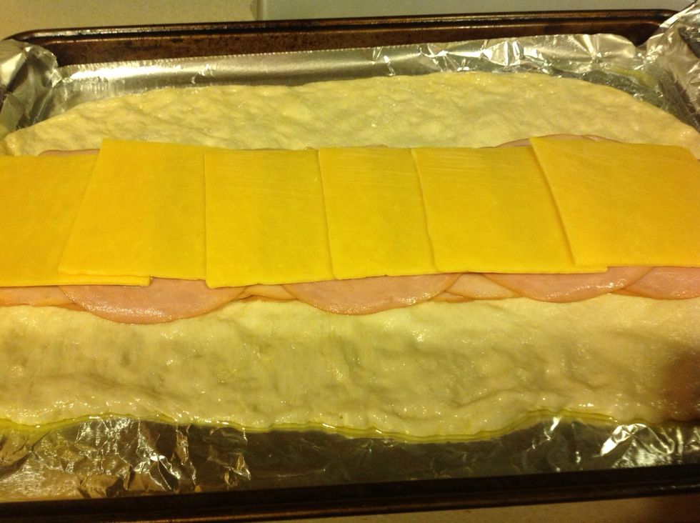 Add six slices of preferred cheese.