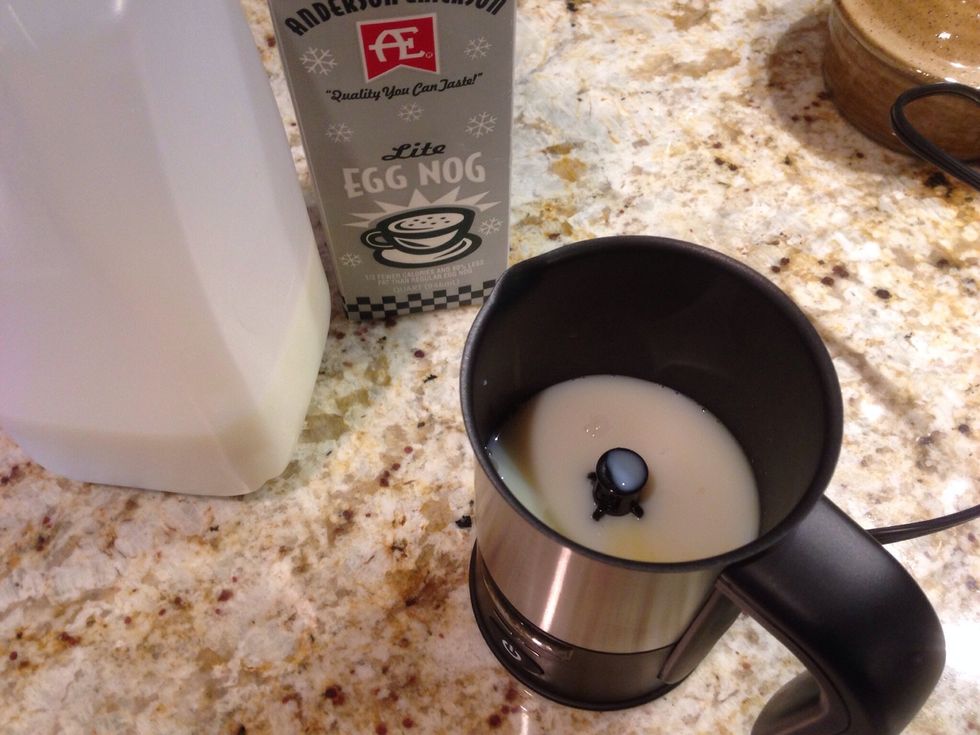 Add skim milk to take the level of the liquid up to the fill line (about 1/3 cup).