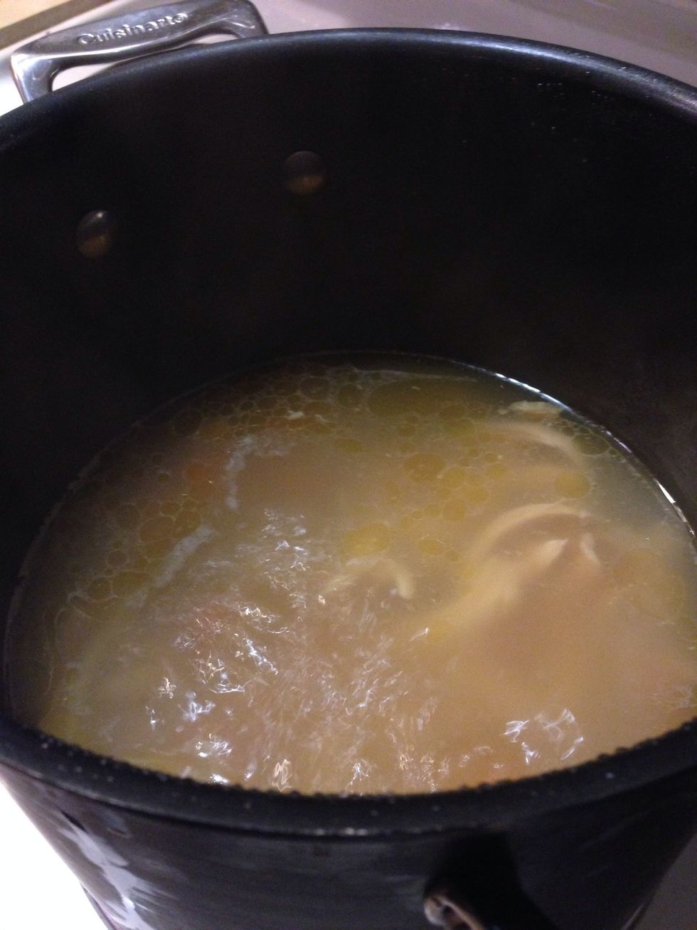 Add slat and pepper to the stock pot and bring to a boil.