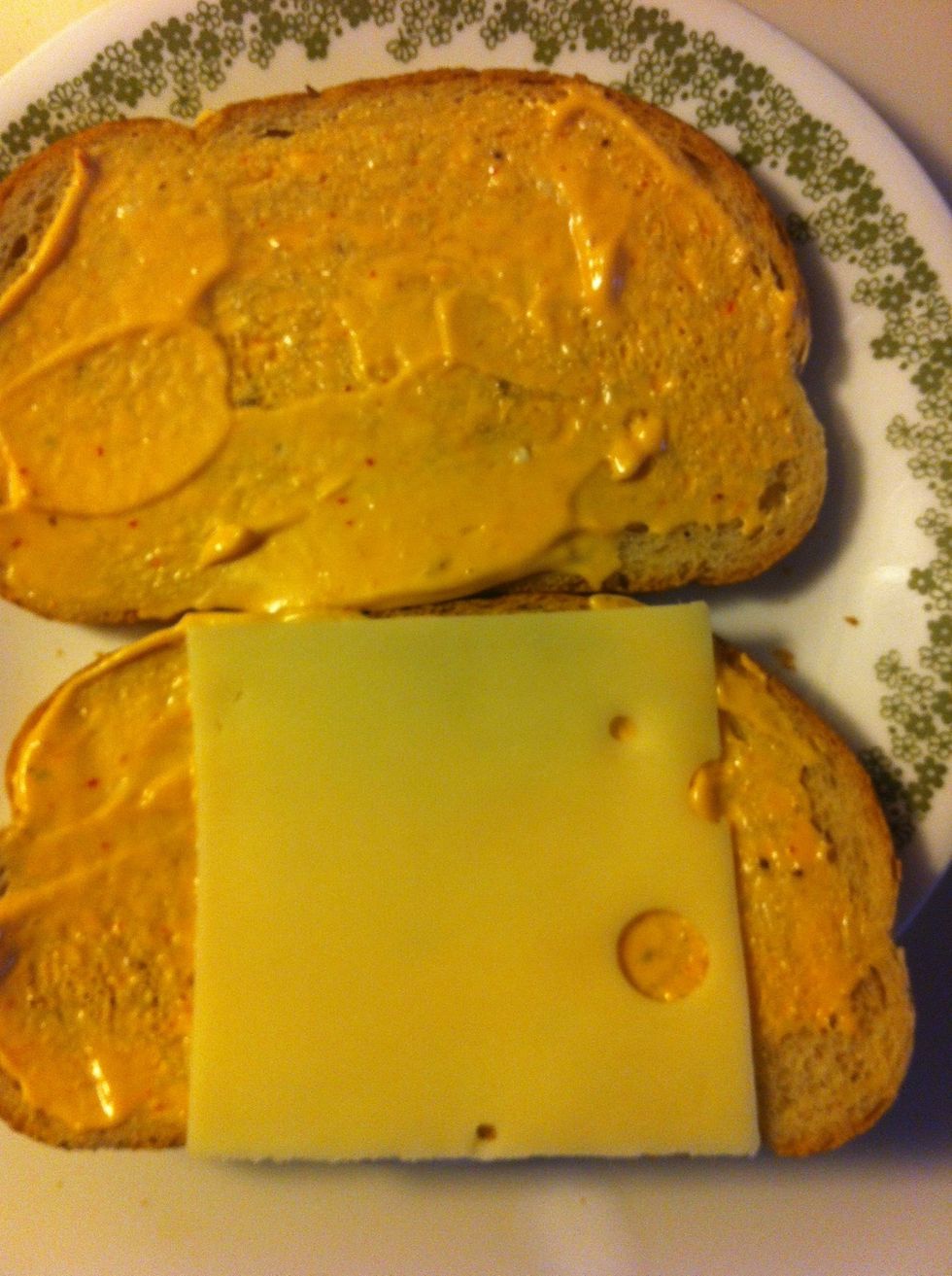 Add slice of swiss cheese to one side. You could use 2 slices if you really like swiss cheese.