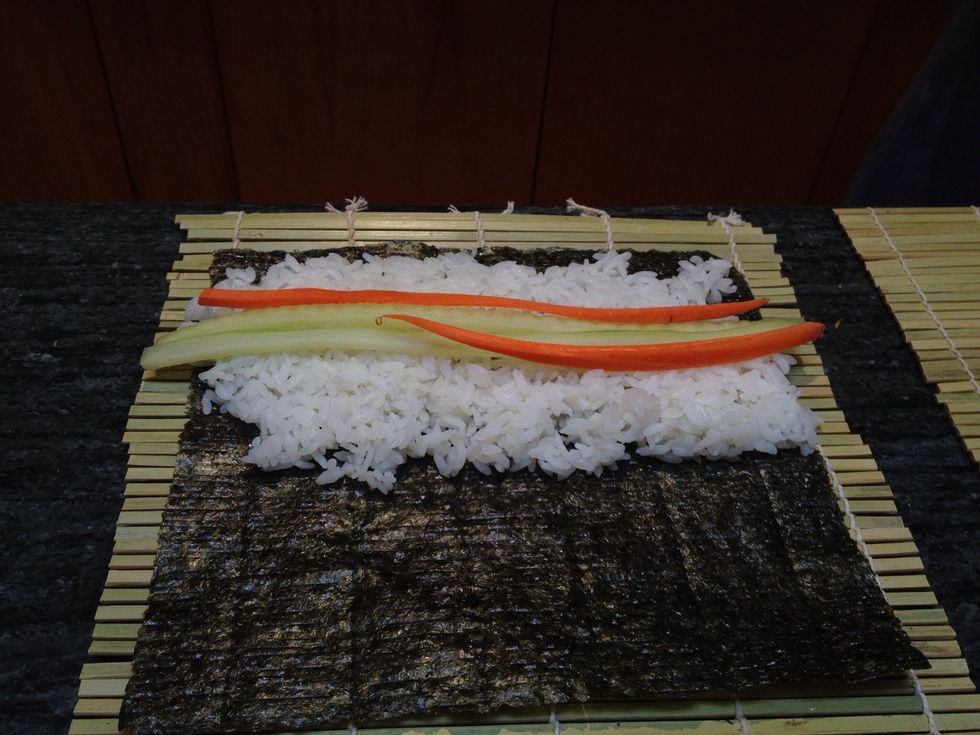 Add sliced carrots. I slice the carrots lengthwise using a mandolin.