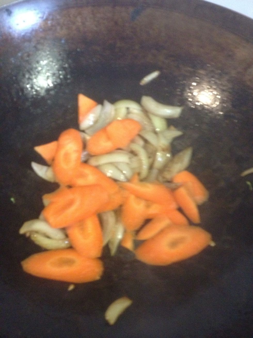 Add sliced carrots. Keep stiring!