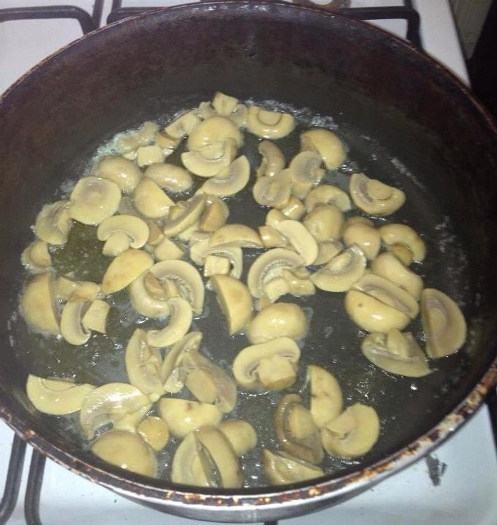 Add sliced mushrooms and stir until they are lightly browned