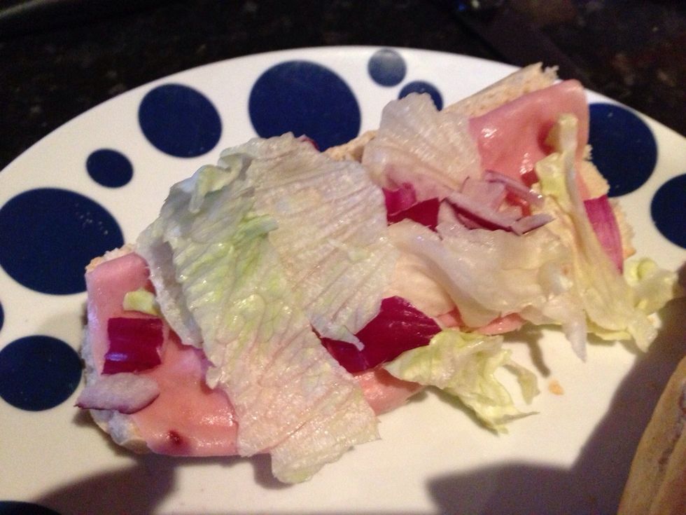 Add sliced red onions.