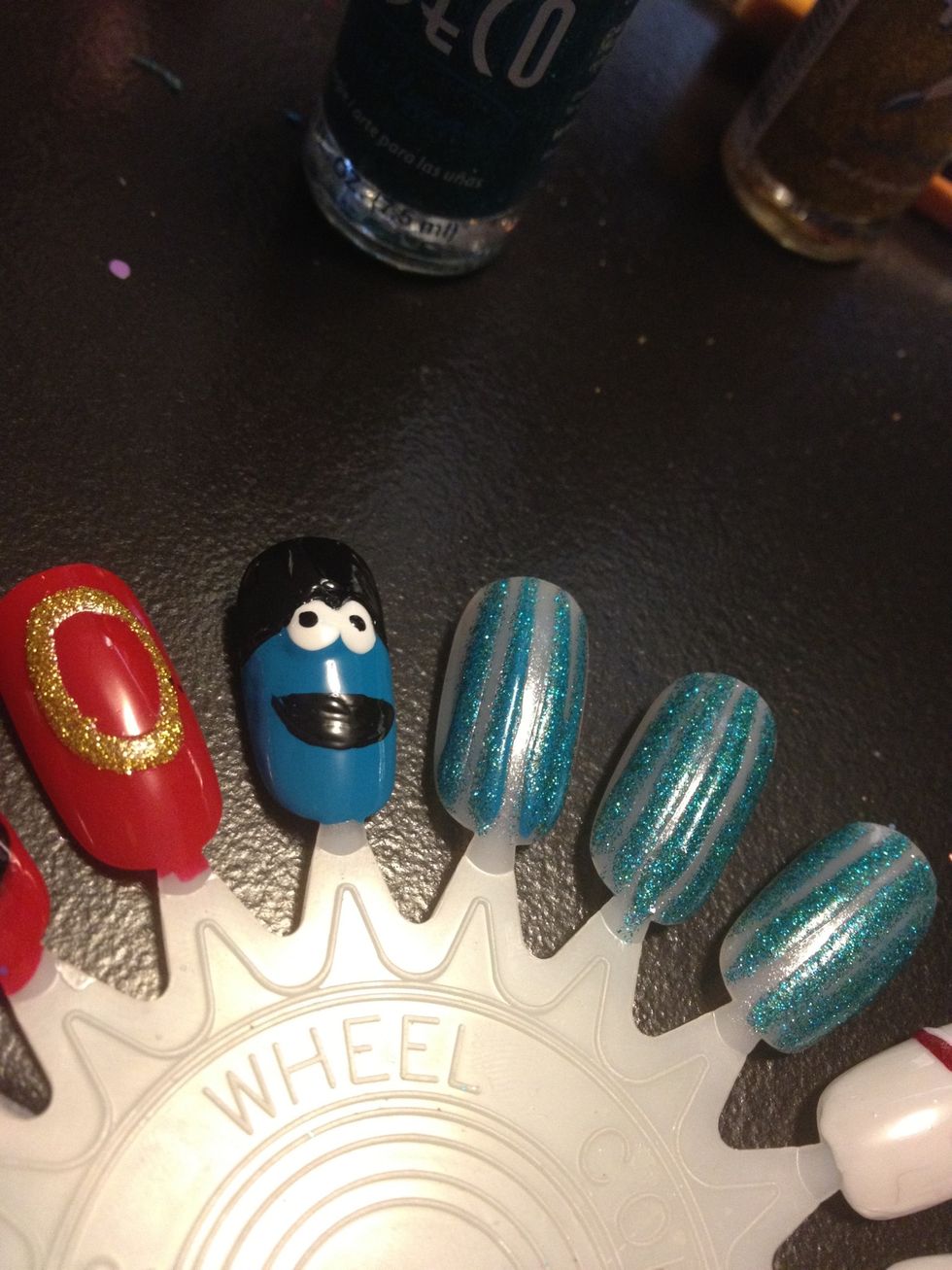 Add small black dots in his eyes