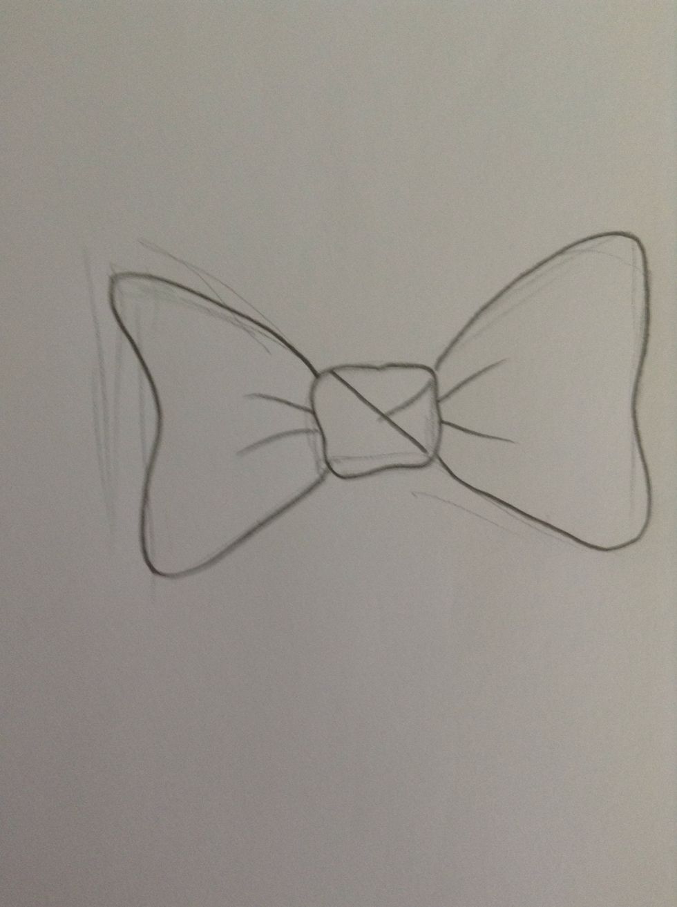 Add small details such as two crease lines on each side and folds in the center knot.