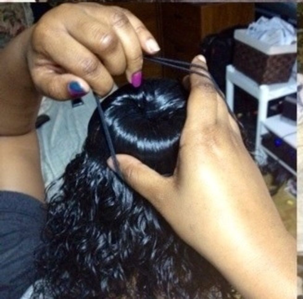 Add small hair ties and twist the remainder of the hair very very tight and tuck under sock.