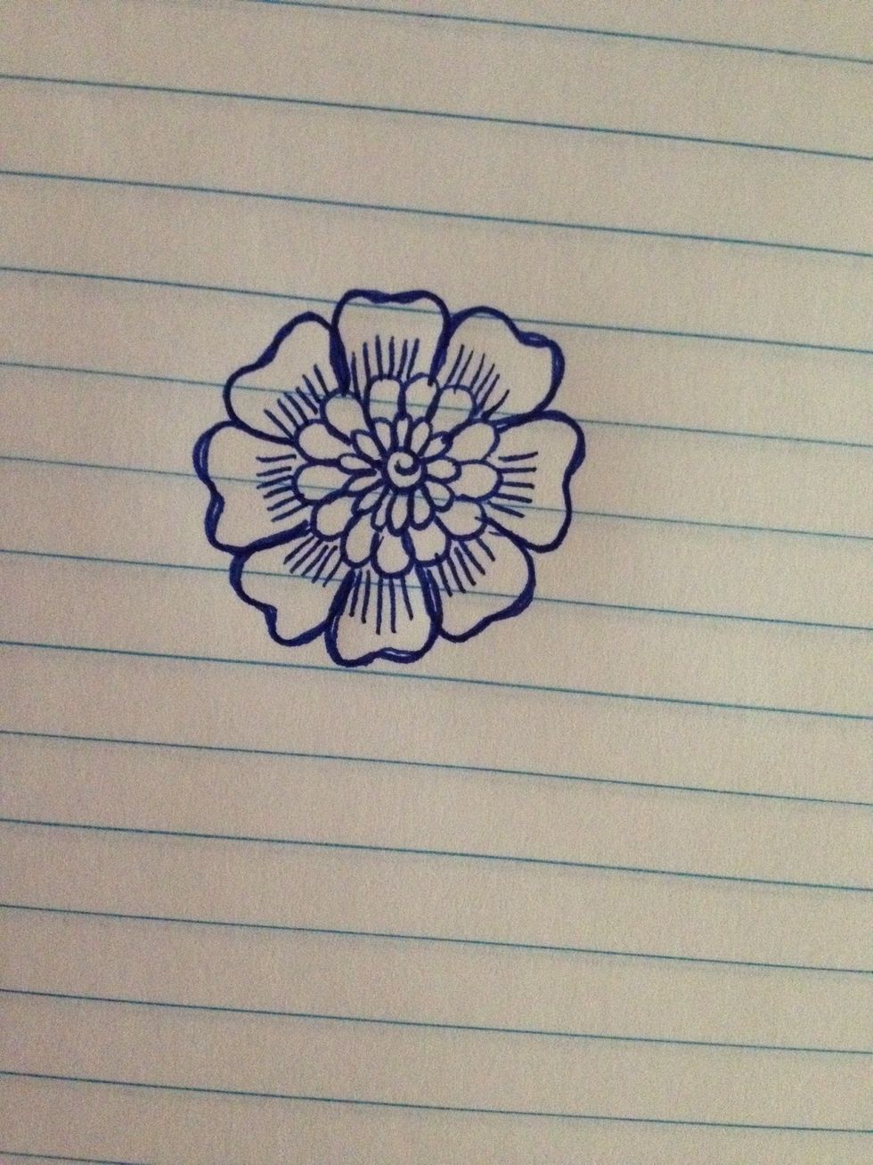 Add small lines inside the large petals to create an intricate effect. Lightly press on your pen and move away from the center of the flower.