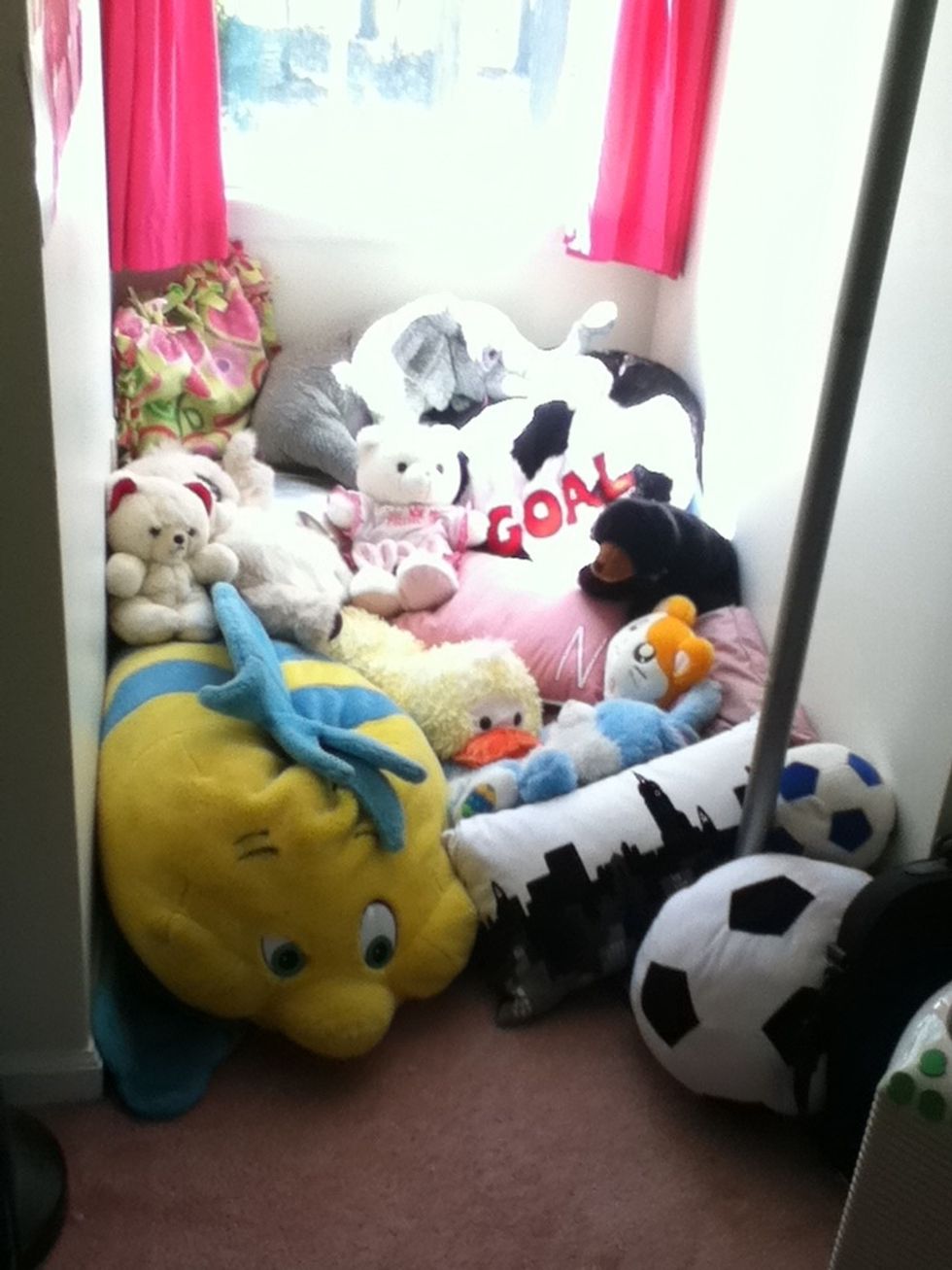 Add small pillows and small stuffed animals. Make sure to test out the space while you decorate! I made mine to where I could lay comfortably.