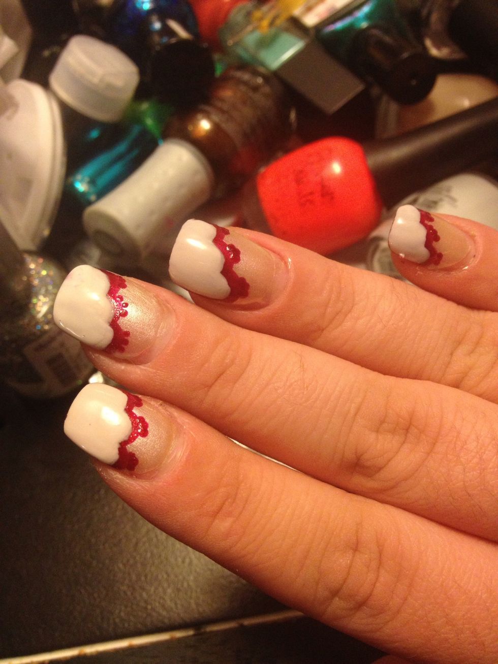 Add small red dots to the top of each red hump. Using a toothpick is preferred, because you need tiny dots. There should be 3 red dots.