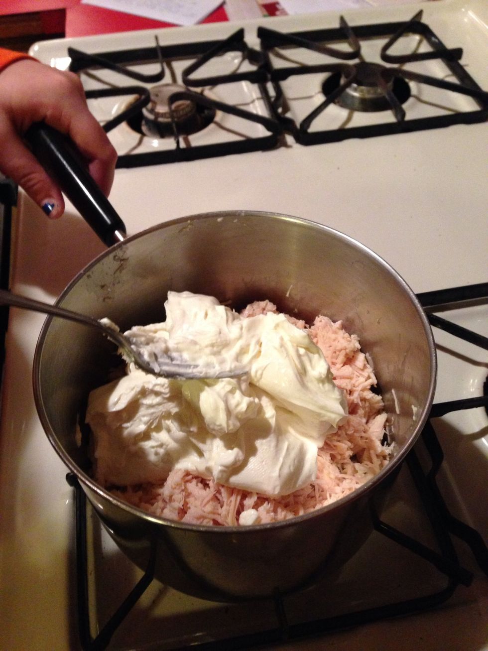 Add soft cream cheese to pan.