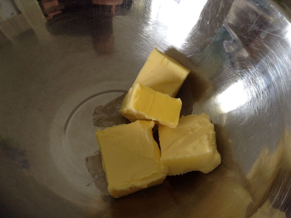 Add softened butter to a bowl