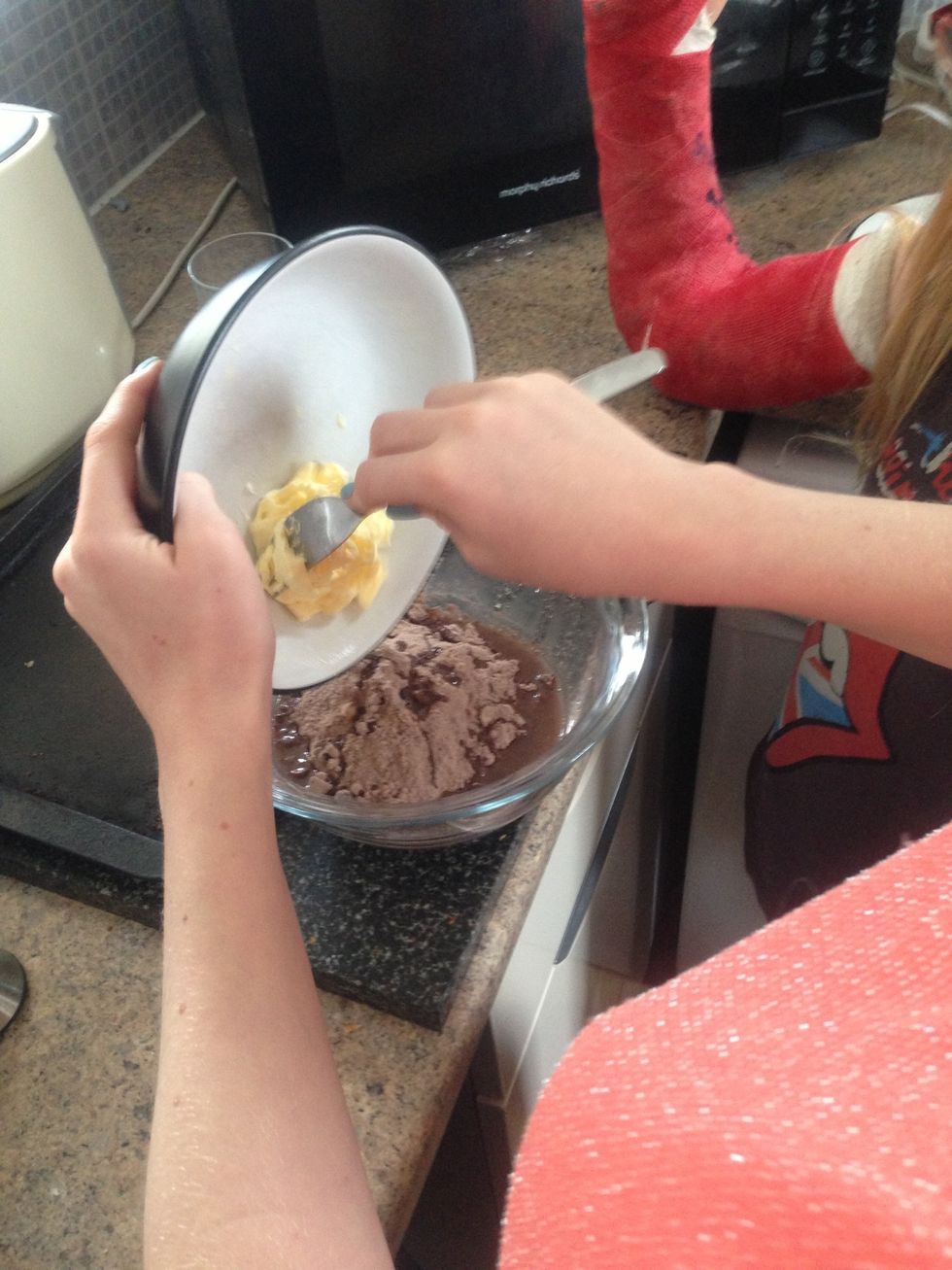 Add softened butter to mixture