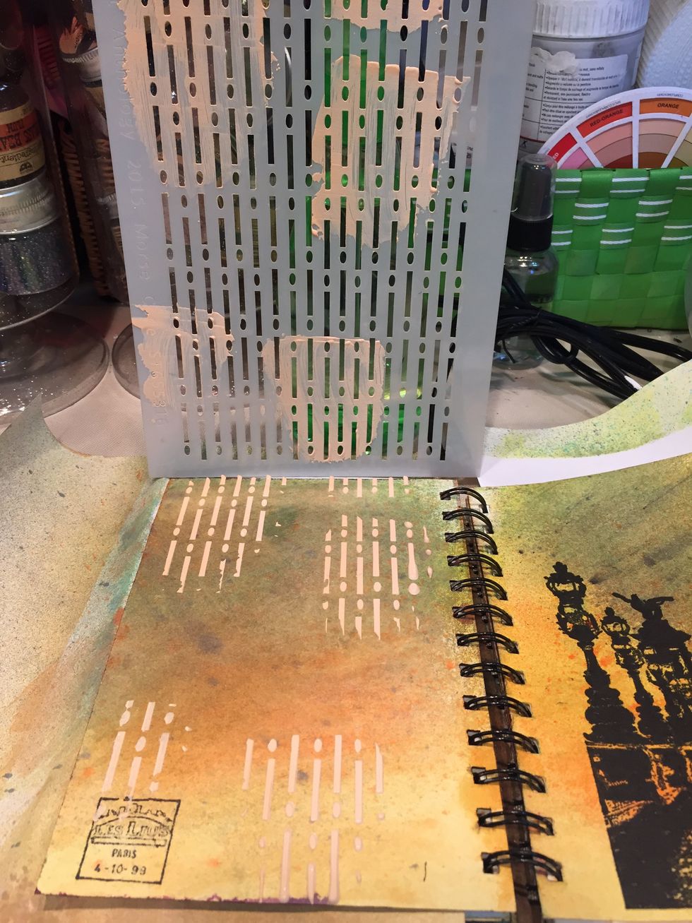 Add some background stenciling with the Mud you just mixed and the Morse Code stencil.