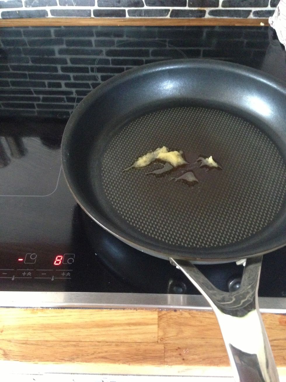Add some butter on a Teflon pan. The pan should be on hight temp, then on medium temp when the first pancake is cooking on it.