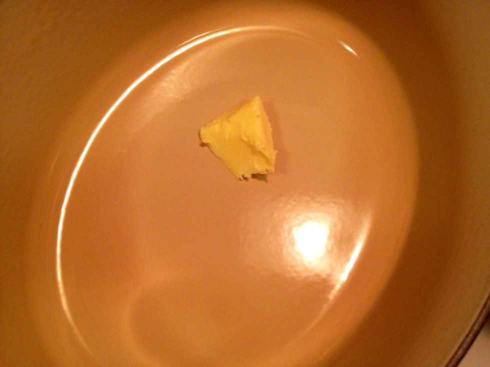 Add some butter to a pan.