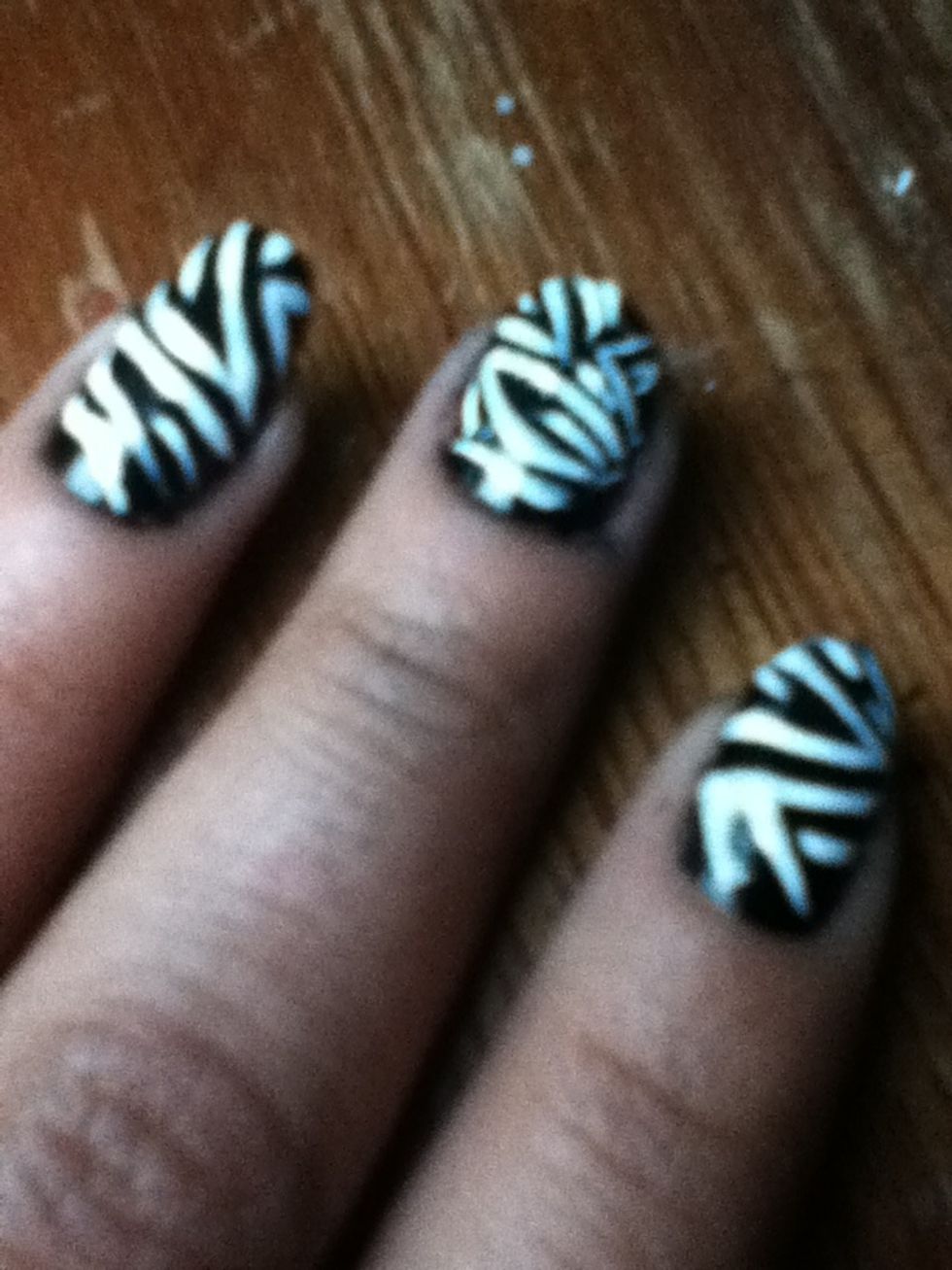 Add some curved lines on to your nails and some straight to You can make random designs so each one look different